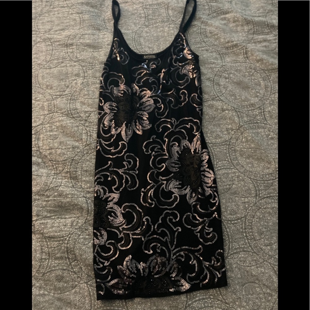 Sexy Express sequin slip dress.
